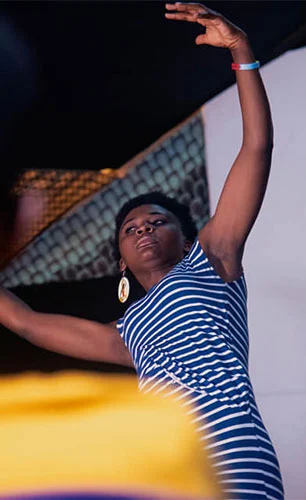 Young person dancing at Yole Africa youth empowerment program