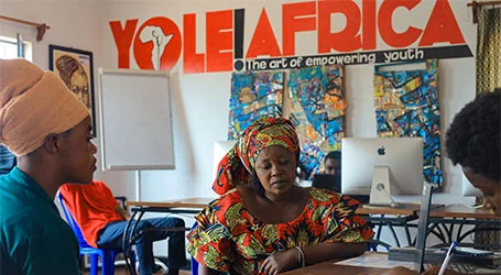Yole Africa educational center interior with branded wall and community workshop